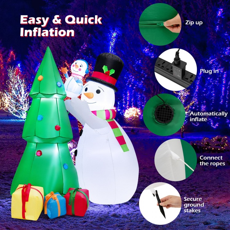Inflatable 6-foot Christmas snowman and tree set with LED lights, featuring gift boxes for festive outdoor decoration.