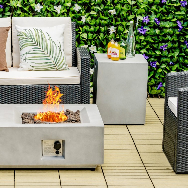 Gray propane tank cover hideaway table with handles, serving as a side table for outdoor use in garden or patio.