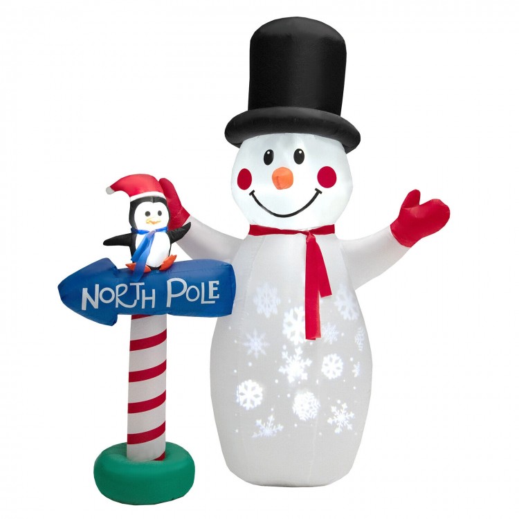 Inflatable snowman decoration with penguin and snowflake projector, perfect for indoor or outdoor holiday cheer.