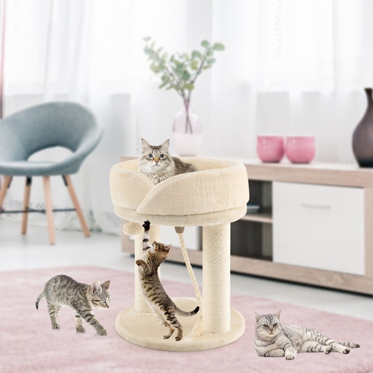 Cat climbing tree in beige with plush perch, sisal scratching posts, and playful fur balls for active cats.