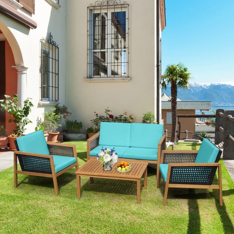 4-piece patio rattan furniture set with turquoise cushions, featuring acacia wood and a large tabletop for outdoor.