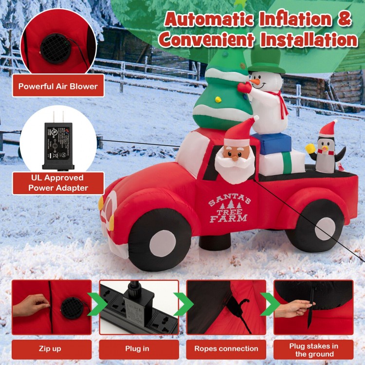 Inflatable Santa Claus in a car with a Christmas tree, snowman, and penguin, featuring a powerful air blower for easy.