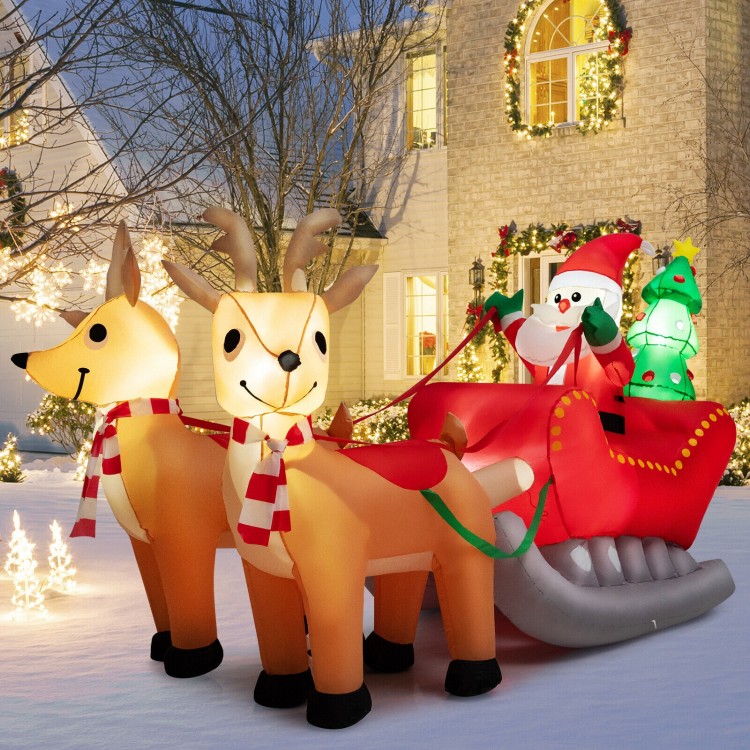 Inflatable Santa on sled with 2 reindeer, 7.2 feet long, featuring LED lights for festive outdoor decoration.