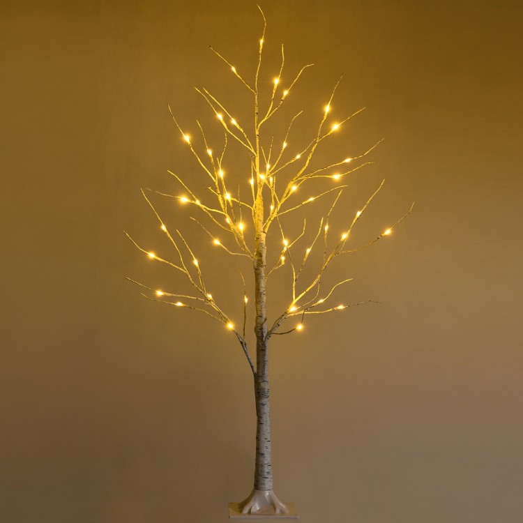Pre-lit 4 ft white twig birch tree with 48 LED lights, perfect for festive indoor holiday decoration.