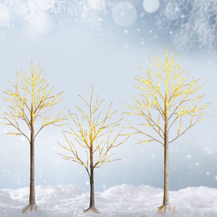 Three pre-lit white twig birch trees with 48 LED lights, perfect for festive indoor holiday decoration.