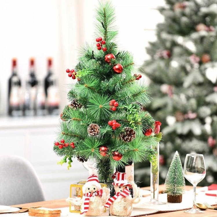 Decorative 29-inch pre-lit Christmas tree with rich ornaments, pine cones, and deep green leaves for festive decor.