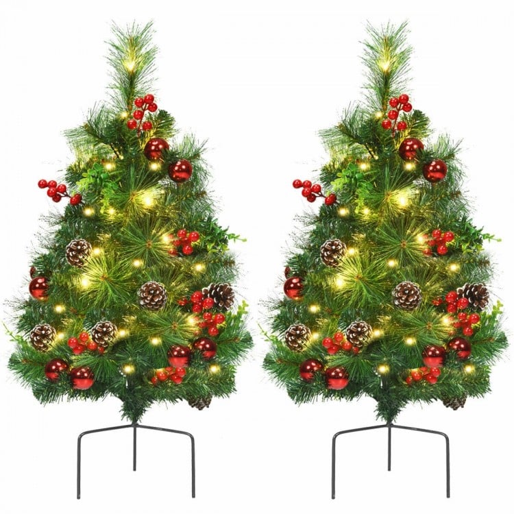 Set of 2 pre-lit 29-inch Christmas trees with rich ornaments, vivid pine cones, and battery-powered design for festive.