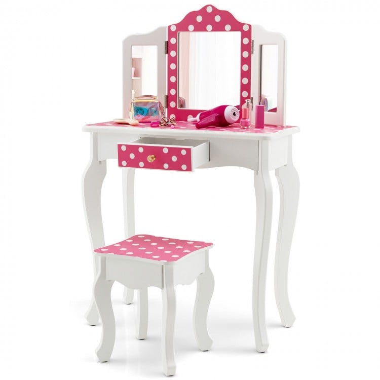 Close-up of the pink polka dot vanity table's drawer with a crystal knob, designed for kids' storage and easy access.