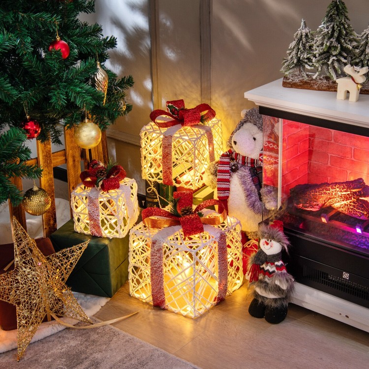 Set of 3 Christmas lighted gift boxes with red bowknots, featuring warm-white LED lights for festive decor.