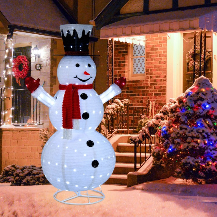 6-foot lighted snowman with a joyful expression, red scarf, and top hat, perfect for creating a festive outdoor.