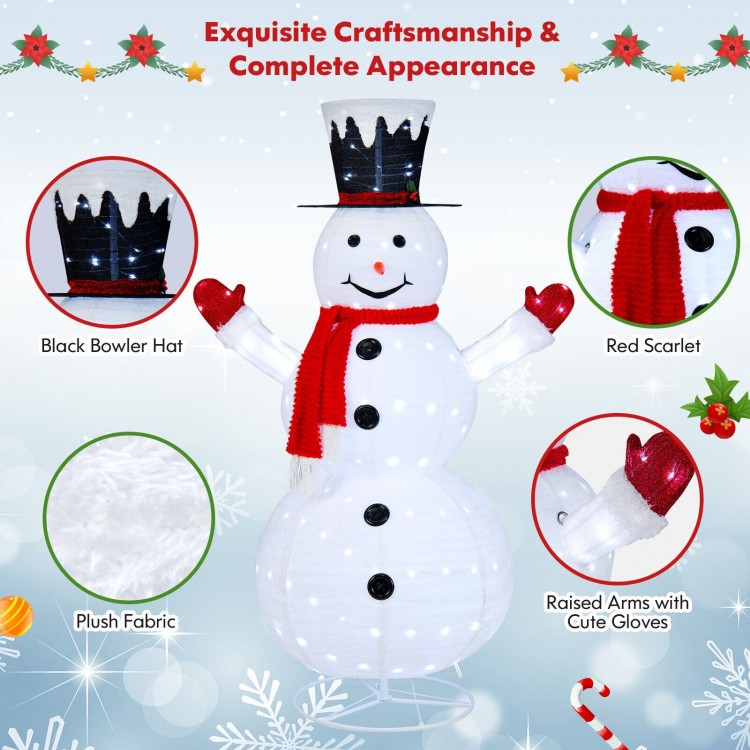 Lighted 6 feet snowman with top hat and red scarf, made of plush fabric, ideal for festive indoor and outdoor.