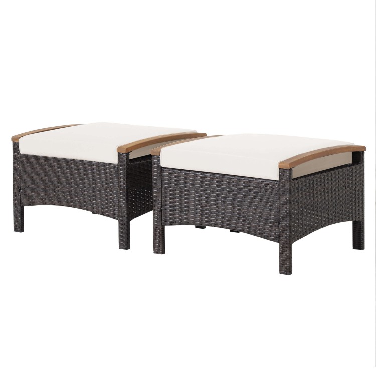 Set of 2 wicker patio ottomans with white cushions, featuring acacia wood handles for versatile outdoor use.