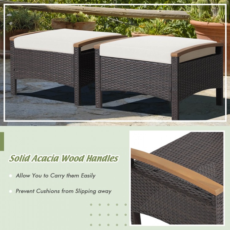 Set of 2 wicker patio ottomans with white cushions and solid acacia wood handles for versatile outdoor use.