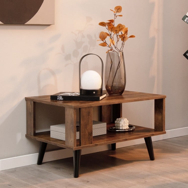 Compact retro mid-century coffee table in rustic brown with open shelf for storage, ideal for living rooms or bedrooms.