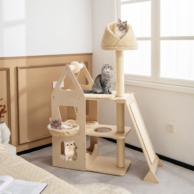 Multi-level cat tree in beige with padded perches, sisal scratching posts, and hammocks for playful cats.