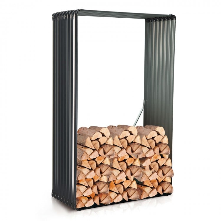 Galvanized metal raised garden bed with wave-shaped surfaces, designed for plant cultivation or as a firewood rack.