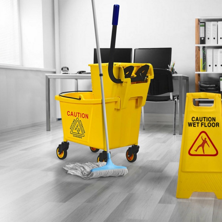 26 quart yellow mop bucket with side press wringer, featuring rubber wheels and caution signs for safety in commercial.