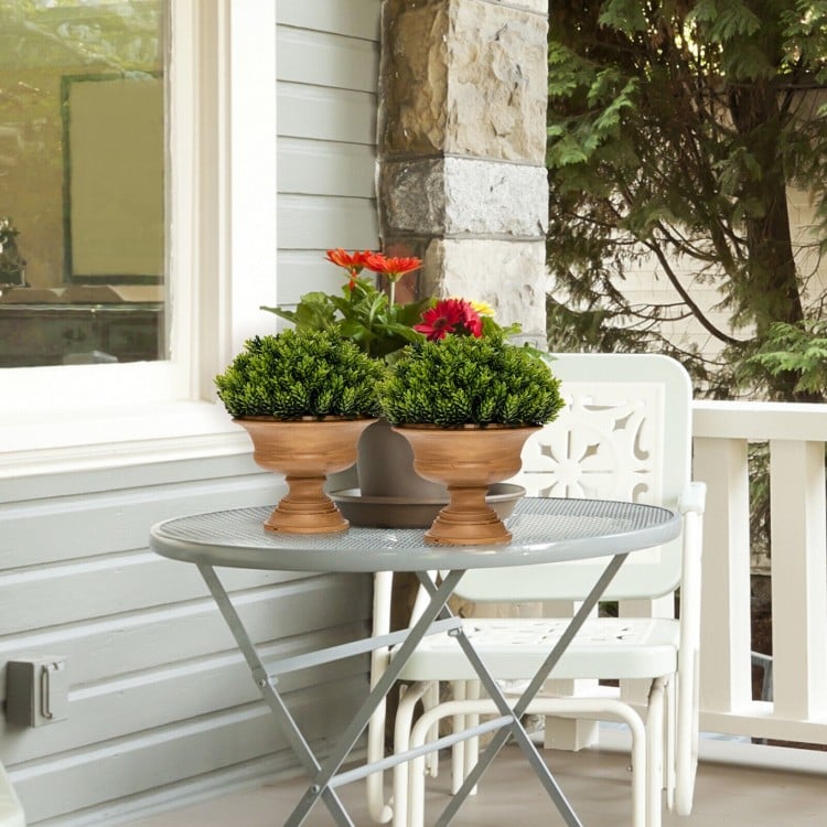 Artificial boxwood topiary trees in golden pots, perfect for table decoration, showcasing a vibrant and realistic.