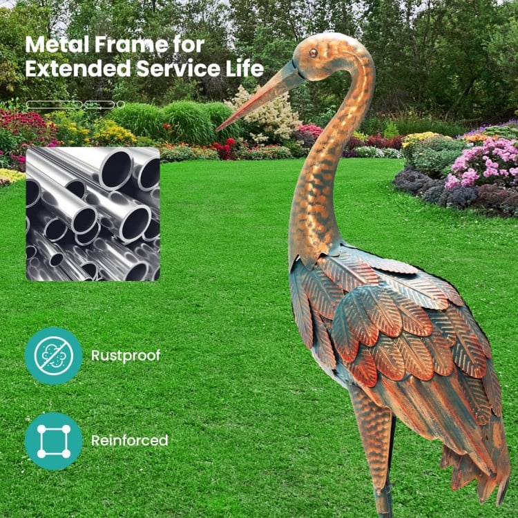 Standing metal crane garden statue with rustproof construction and detailed feathers, ideal for backyard decoration.
