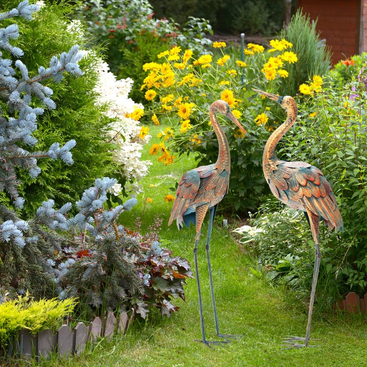 Set of 2 standing metal crane garden statues with U-shaped stakes, featuring detailed feathers for charming outdoor.