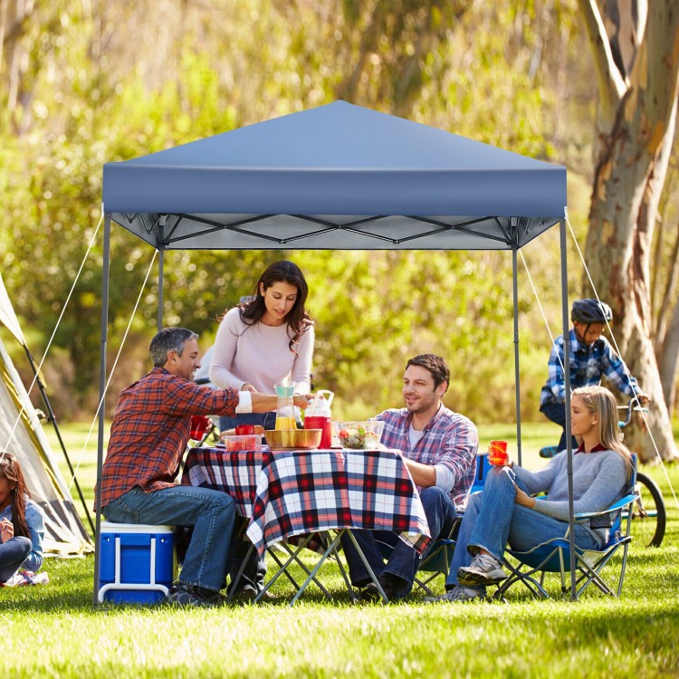 Outdoor pop-up canopy tent in blue, 6.6 x 6.6 feet, providing UPF 50+ sun protection for gatherings and picnics.