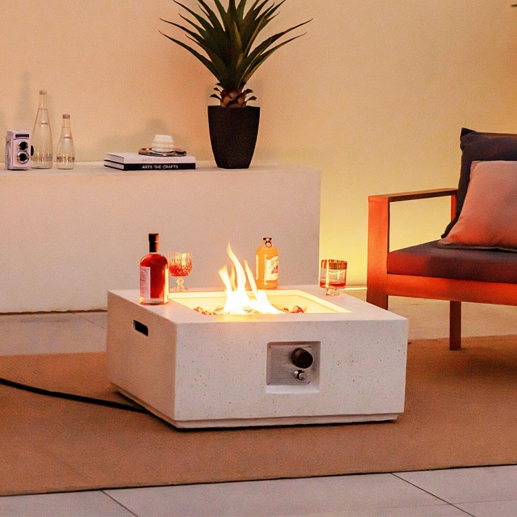 Square 28-inch propane gas fire pit in white terrazzo with lava rocks, perfect for outdoor patio warmth and ambiance.