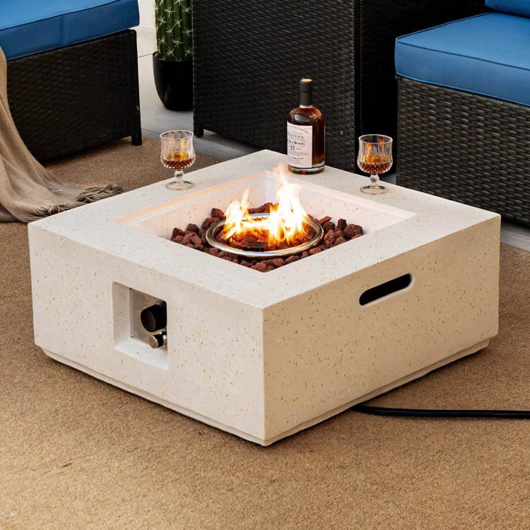 Square 28-inch propane gas fire pit in white terrazzo with lava rocks, providing 40,000 BTU warmth for outdoor.