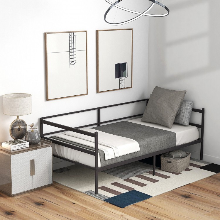 Twin size metal daybed frame in modern style with gray bedding, ideal for living room or bedroom use.