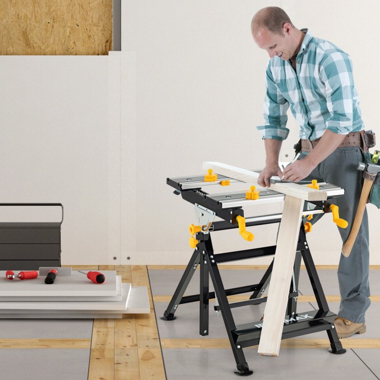 Folding work table with adjustable height and tiltable platform, featuring non-marring clamps for secure workpiece.