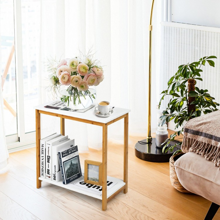 Compact 23-inch end table with a bamboo frame and white MDF top, styled with decorative items for a modern touch.