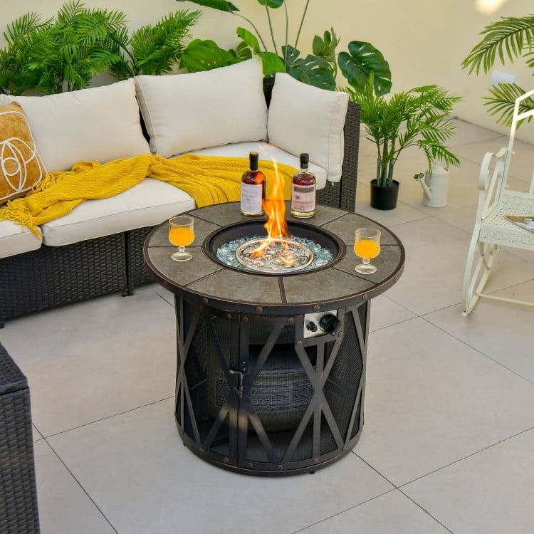 32-inch fire pit table with fire glass, featuring a durable metal frame, ideal for outdoor warmth and relaxation.