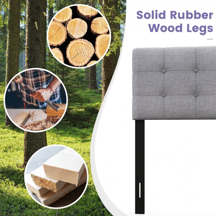 Gray linen upholstered headboard with solid rubber wood legs, featuring button tufting for added comfort and style.
