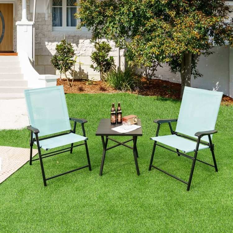 Light green patio dining chairs with armrests and metal frame, perfect for outdoor use in garden or backyard.