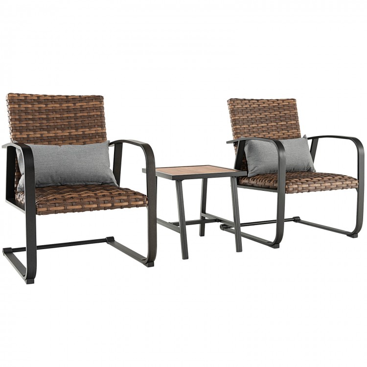 Two brown PE rattan chairs with lumbar pillows and a DPC tabletop, ideal for outdoor patio conversation.