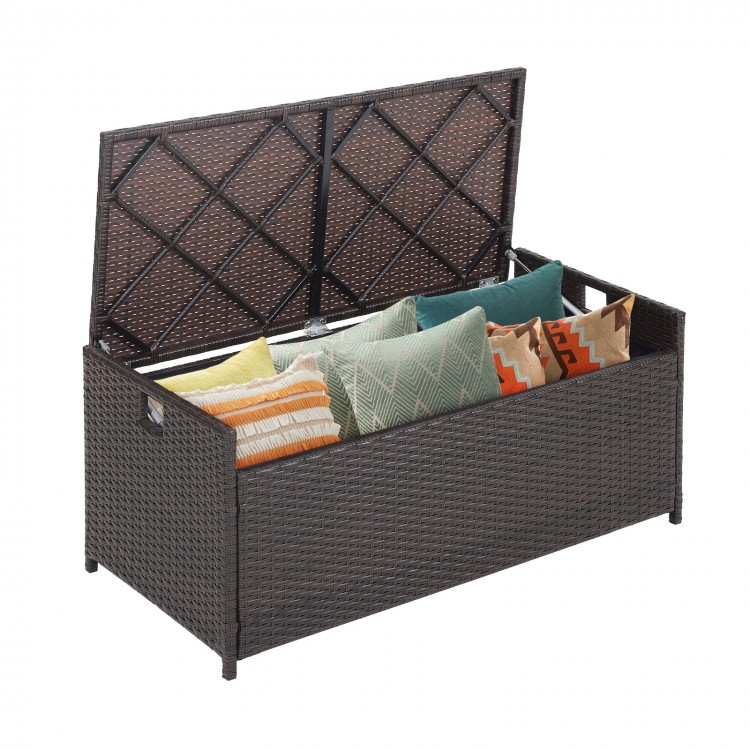 Patio storage bench with a 34-gallon capacity, made of brown PE rattan, featuring a soft seat cushion and gas struts.