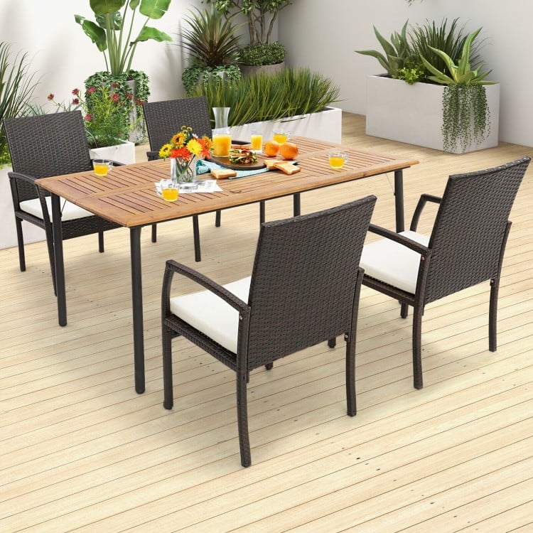 Patio wicker dining armchair set with soft zippered cushions, featuring ergonomic design and durable PE rattan for.