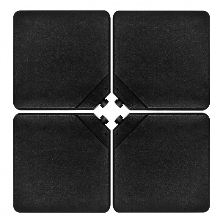 Four black patio umbrella base plates made of durable HDPE, designed for easy filling and stacking for convenient.