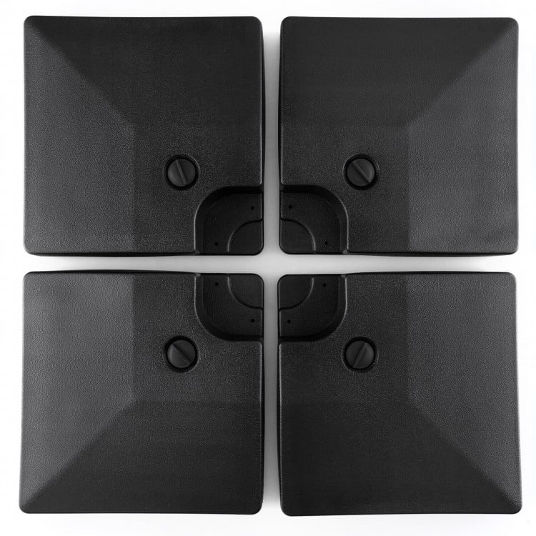 Four stackable black HDPE plates for a 20L cantilever offset patio umbrella base, designed for easy transport and.