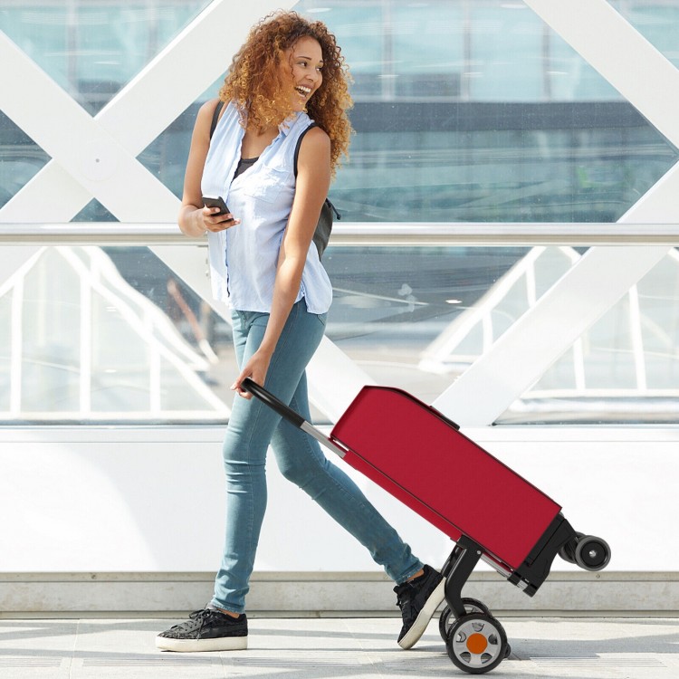 Folding shopping cart in red with 360° swivel wheels, lightweight aluminum base, and ergonomic handle for easy mobility.