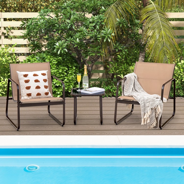 Patio conversation set featuring two chairs with breathable fabric and a glass-top table, perfect for poolside.