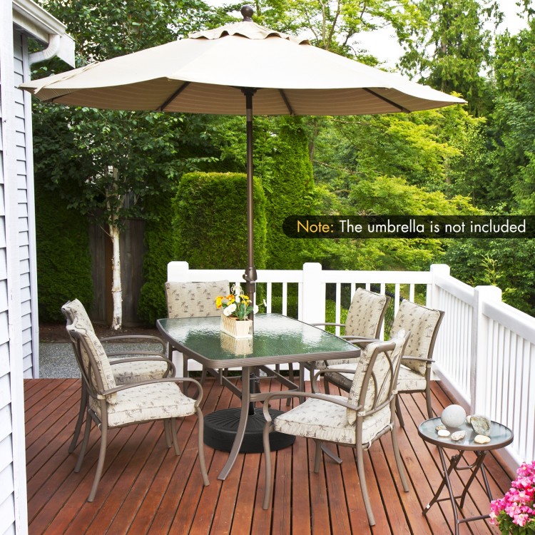Fillable round umbrella base stand in black, made of durable HDPE, designed for stability in gardens and patios.