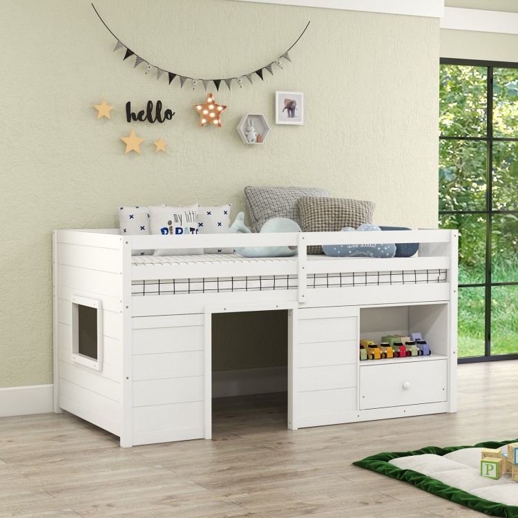 Twin size solid wood low loft bed in white with storage drawer and open shelf, ideal for kids' rooms and play areas.