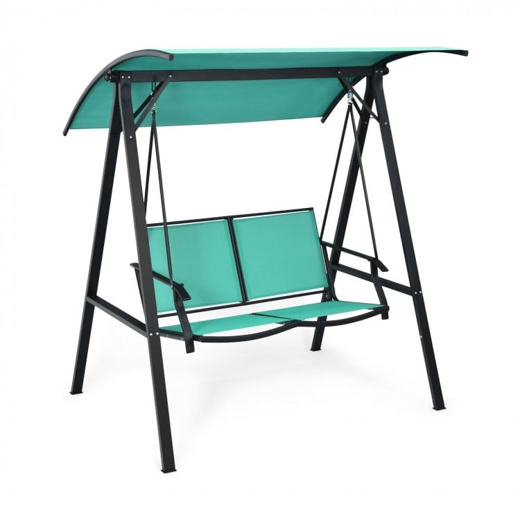 Two-person patio swing with a green weather-resistant canopy, perfect for outdoor relaxation on decks or gardens.