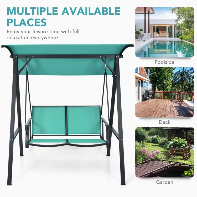 Two-person patio swing in green with adjustable canopy, perfect for poolside, deck, or garden relaxation.