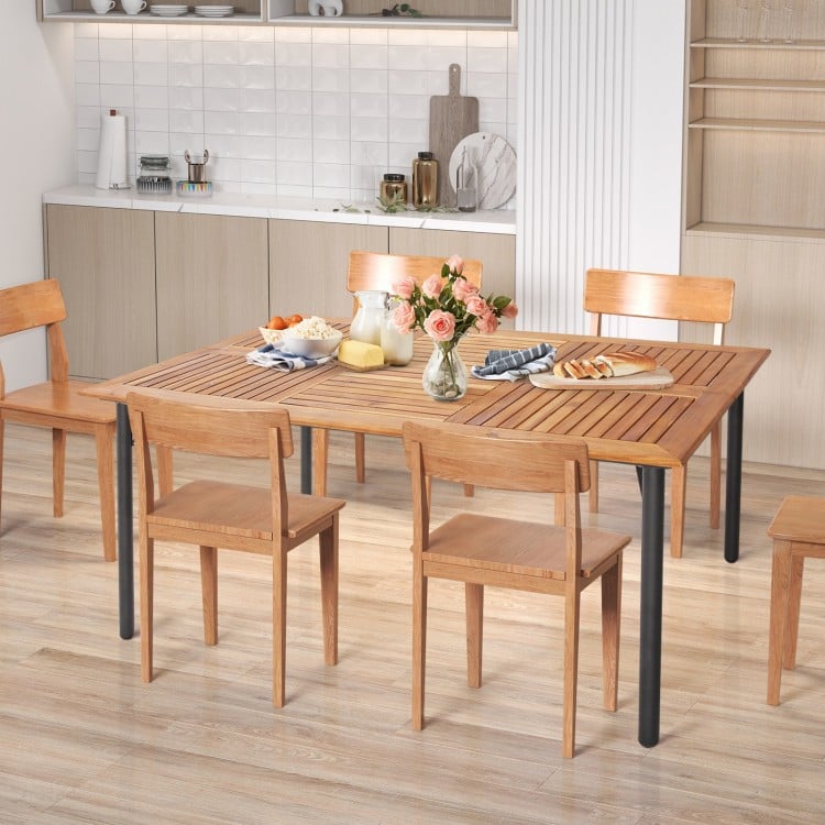 Acacia wood dining table with metal legs, featuring an umbrella hole, perfect for indoor or outdoor dining for six.