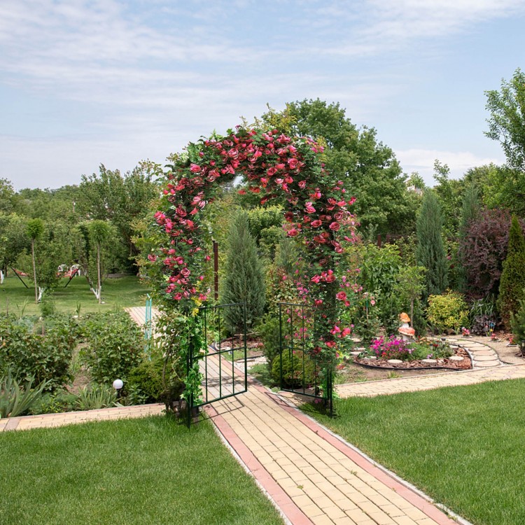Garden arch arbor trellis with gate in black, adorned with vibrant flowers, enhancing garden appeal and creating an.