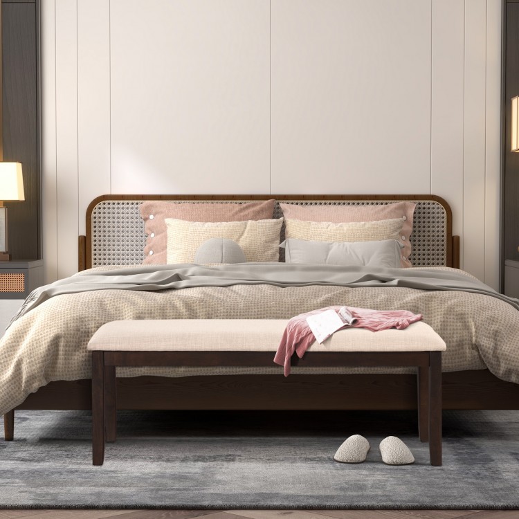 Upholstered ottoman bench with padded cushion in beige, perfect for bedroom seating and stylish indoor decor.