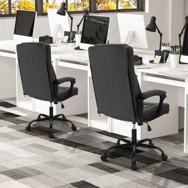 High back ergonomic executive chair in black with thick headrest cushion and adjustable height for office use.