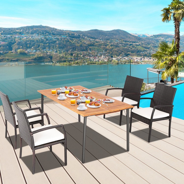 5-piece patio dining set featuring acacia wood table and cushioned PE rattan chairs, perfect for outdoor meals.