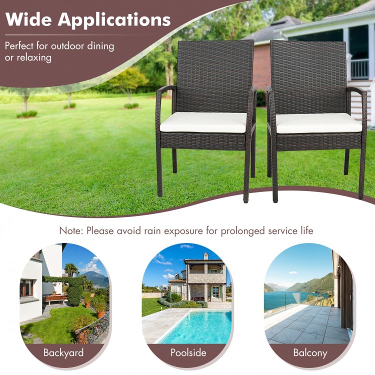 Two cushioned patio chairs made of hand-woven PE rattan, perfect for outdoor dining or relaxing in the backyard.